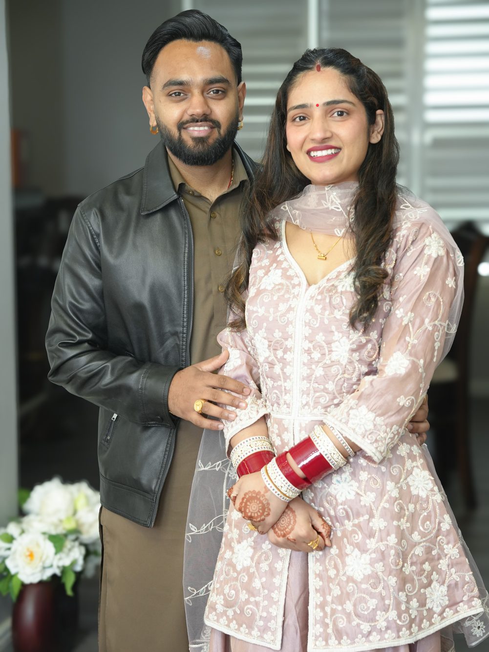 Punjabi couple Lakhwinder and Harpreet sharing a quiet moment at their Bella Vista home wedding ceremony